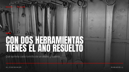 Llave de skate y tornillería sobre un banco de trabajo, artículo de Slidershop Sabadell