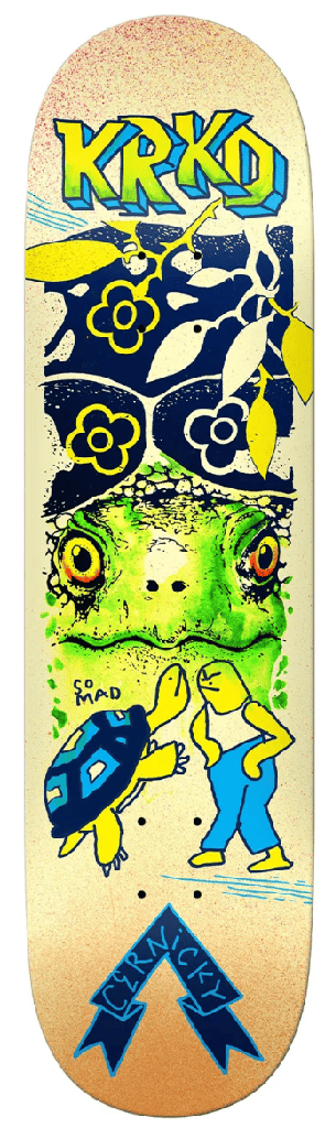 Tabla Krooked Cernicky Mad Turtle True Fit 8.5 con tortuga verde y gráfico multicolor sobre fondo claro